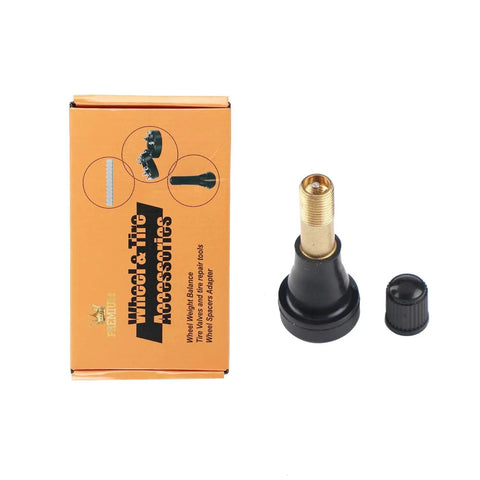 TR600HP High Pressure Brass Tire Valve Stem with packaging, snap-in design, visible brass and rubber components.