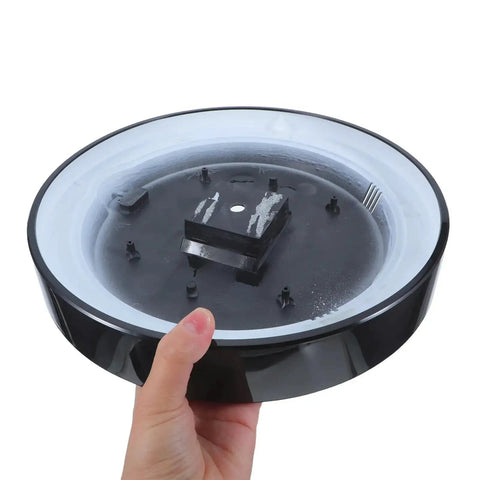 Quartz Wall Back Cover For 12 Inch Round Clock Replacement Rear Panel Shell And Backplate held by a hand, black and white design.