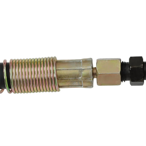 Close-up of Heavy-Duty 10 Ton Hydraulic Knockout Punch Driver Kit hose connector with coiled metal reinforcement for durability.
