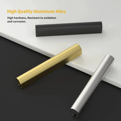 High quality aluminum alloy handles in gold, silver, and black finishes on a white surface