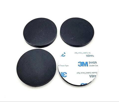 Four two inch wide round silicone rubber bumper feet with adhesive backing for non-slip waterproof spacing on furniture and appliances.