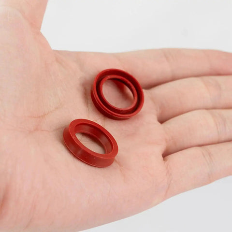 10 Pieces Silicone O Rings For Coffee Makers And Espresso Machines Seals Replacement Gaskets in red, shown on a hand