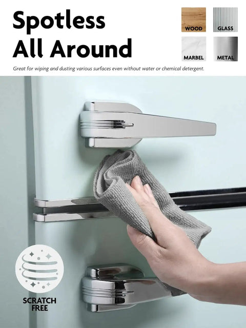 Hand wiping chrome handle using Microfiber Cleaning Cloth Roll 60 Pack Tear Away Towels 12x12 Reusable Pink Grey on appliance