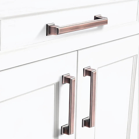 Brushed Antique Copper Kitchen Cabinet Pulls And Knobs Set, 5 Inch, Square Zinc Alloy Drawer Handles For Dresser, 5 Pack With Classic Finish For Farmhouse And Modern Cabinets By GRANTENOV installed on white cabinets