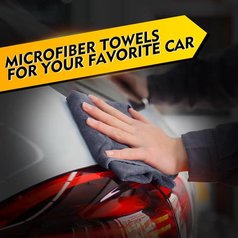 Person using Ultra Absorbent Microfiber Cleaning Cloths 12 Pack 12.5 X 12.5 Inch Towels For Cars Kitchen And Windows Lint Free Streak Free Soft Grey HOMEXCEL on car's rear.