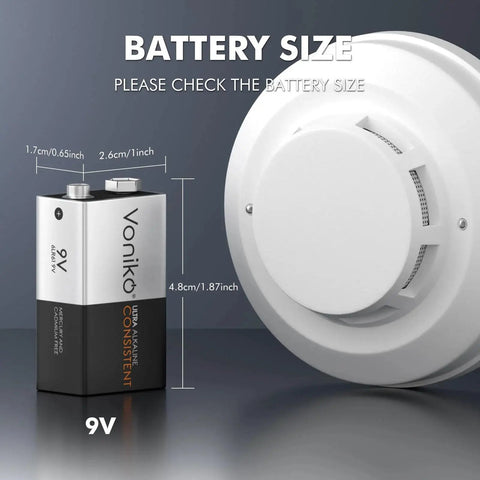 9V battery from Alkaline Battery Combo Pack With 24 AA 24 AAA And 8 9V For Household Electronics shown beside smoke detector