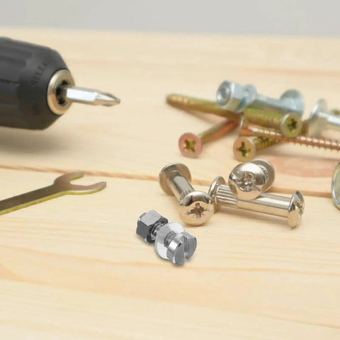 Pair M Two Point Five By Zero Point Four Five By Seven Pro Grade Miniature Screws for turntable repair kit, shown on wood surface.