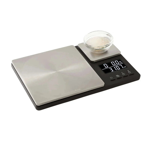Dual Platform Digital Kitchen Scale For Home Chefs With 11 Lb And 16 Oz Capacity on countertop with backlit LCD and stainless steel finish