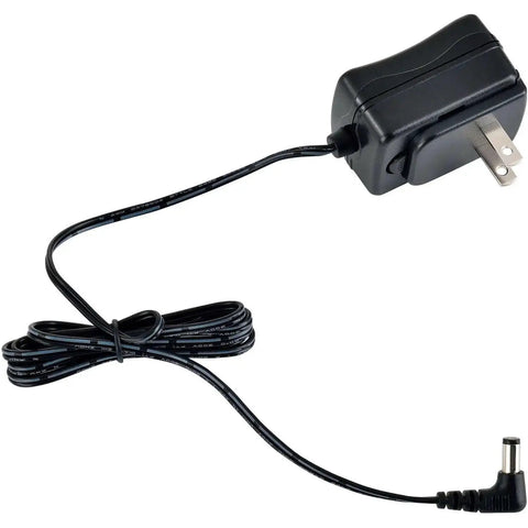 Black AC power adapter with a cord and plug, suitable for electronics, visible plug prongs and cable.