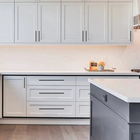 Modern kitchen cabinets with 10 Pack Matte Black Cabinet Pulls 5 Inch 128mm Hole Centers Kitchen Cabinet Handles installed.