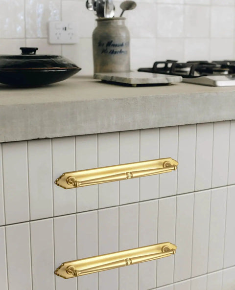 Champagne Bronze Cabinet Pulls 5.04 Inch Center To Center With Back Plate Zinc Alloy 2 Pack installed on white kitchen drawers