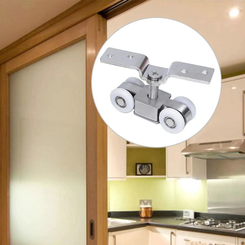 Four Wheel Stainless Steel Hanging Wheel Kit for Sliding Doors installed in kitchen, shown close-up with door.