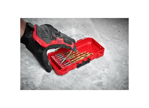 Titanium Shockwave Drill Bit Kit 15 Piece Set For Metal Wood And Concrete With Easy Installation Pro Grade High Speed Titanium Coated Bits For Long Lasting Performance Milwaukee 48 89 4670 Red in a red case on concrete