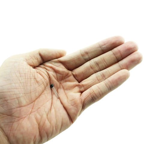 Hand holding Premium Linear Hall Effect Sensor Pack 49E OH49E SS49E S49E three-pin in black housing for current sensing