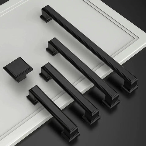 Matte Black 5 Inch Cabinet Pulls 10 Pack With 128mm Hole Centers Durable Kitchen Cabinet Hardware on display with cupboard door