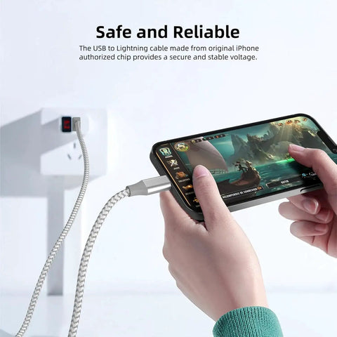 Hands holding smartphone connected to wall outlet using MFi Certified Lightning Cable 3 Pack Nylon Braided 10 Ft Fast Charge For iPhone.