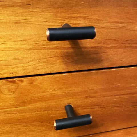 Solid Stainless Steel Euro Style Bar Cabinet Pulls 25 Pack One And Three Quarter Inch Length Oil Rubbed Bronze Finish on wooden drawers