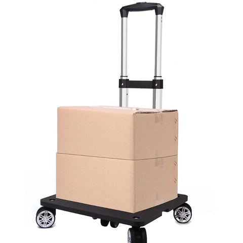 Folding Five Wheel Luggage Cart With Adjustable Height in use carrying two cardboard boxes, showcasing heavy-duty capability and compact design.