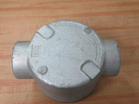 Explosion Proof Junction Box C Style 2 Inch Hub GUAC69 for Hazardous Locations, metal enclosure on wooden surface, Crouse Hinds