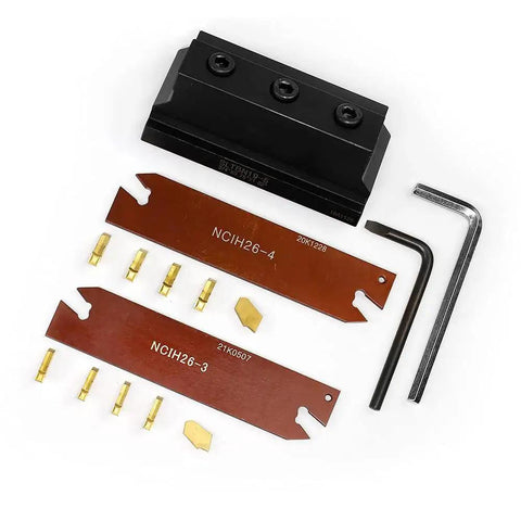 Pro Grade Three Quarters Inch Self Lock Block Tool Holder Set With Adjustable Blade NCIH26 3 And NCIH26 4 Plus Tin Coated GTN 3 And GTN 4 Carbide Inserts SLTBN19 5 Oscarbide shown with inserts and wrench; top view.