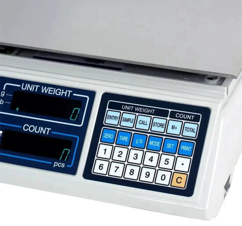 Close-up view of SC Series Precision Counting Scale with 50 pound capacity, showing keypad and LED displays for batch counting.