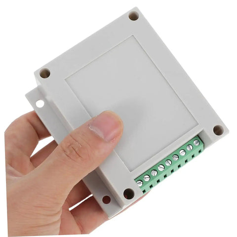 Tough Yet Compact Weatherproof Junction Box For Industrial Use shown held in hand, ABS plastic, gray, compact size, power supply enclosure.