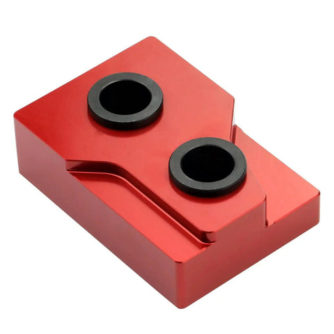 Camshaft Bearing Removal And Installation Tool For Twin Cam 1999 To 2006 Fits Cam Support Plate, solid red steel block with black inserts.