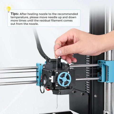 Inserting needle into 3D printer extruder for maintenance, part of Beefed Up Hardened Steel MK8 3D Printer Nozzles Set With Storage Box And Handy Tools