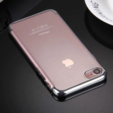Smartphone with rose gold back cover and clear protective case displayed on a black surface.