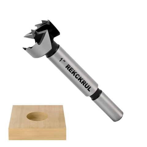 1 Inch Forstner Drill Bit For Woodworking With Ultra Sharp Serrated Edge And Center Spur For Precise Starts And Clean Flat Bottom Holes In Hardwood Plywood And Plastic Pro Grade Hinge Installations Pocket Holes And Overlaps on display with sample wood block.