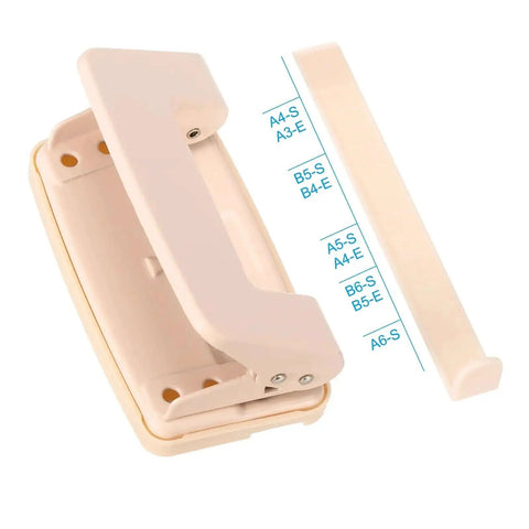Cream colored multi-size paper punch with guide insert