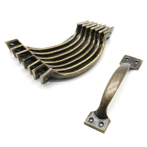 Rustic Bronze Cabinet Handles Set Of 8 Five And A Half Inch Curved Metal Drawer Pulls with Screws for cabinets and doors.