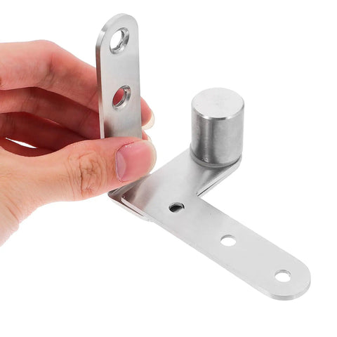 Heavy Duty Stainless Steel Door Pivot Hinges With Automatic Rebound for hidden doors, shown in hand, close-up view