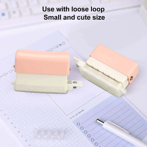 Portable 6 Hole Punch Adjustable Metal Handy Hole Puncher With Chip Tray And Positioning Pillar in light pink color