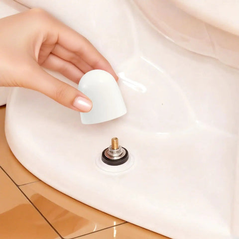 Universal Toilet Bolt Caps Pack of 6, White 1.44 Inch Round Push On Covers With Washers shown being installed on toilet bolt