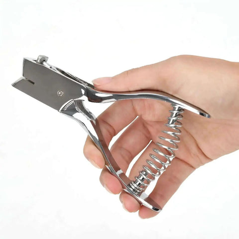 Hand holding Tough As Nails Heavy Duty Handheld Hole Punch For ID Cards And Plastic PVC Cardstock Cardboard Built With Zinc Alloy