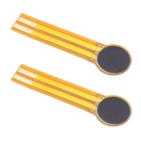 Two FLEXMAN thin-film pressure sensors with round black sensing pads on orange flexible film