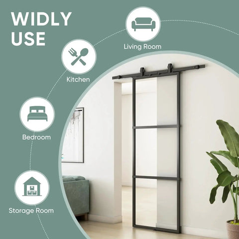 Clear Tempered Glass Barn Door 28 Inch By 84 Inch With Carbon Steel Frame Pre Drilled For Easy Assembly Including 5 Foot Hardware Kit And Soft Close System For Smooth Sliding And Modern Interior Spaces installed in living room
