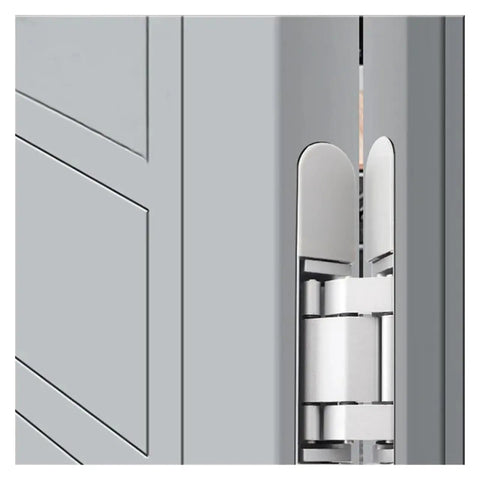 Close-up of silver hidden door hinge installed on frameless door, focusing on the hinge mechanism with sleek silver finish.