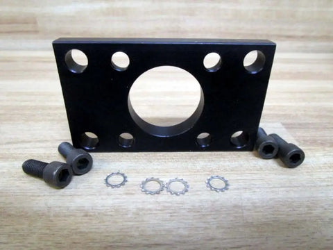 Flange Mount Kit P057339K0001 with eight hole mounts for 1/4-20 thread, showing black plate with bolts and washers on a wood background