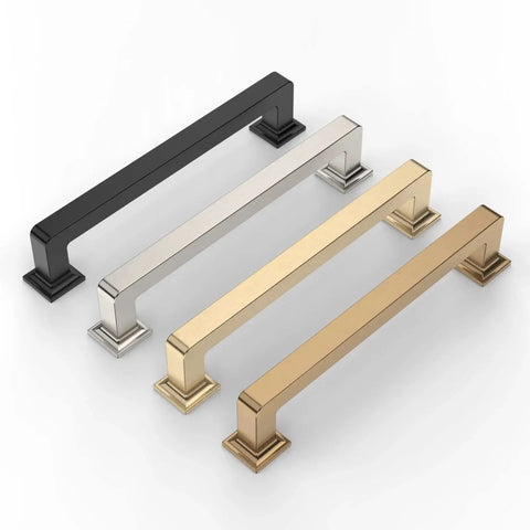 Four cabinet handles in black, silver, gold, and champagne bronze finishes displayed on a white background.
