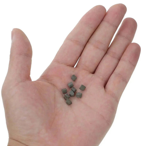 Hand holding Triangle Polishing Abrasive Media 4mm 500g for Tumbling Machines Jewelry Buffing and Rock Tumbling Polishers
