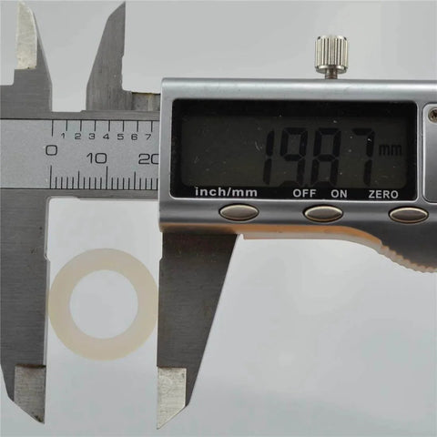 Non Conductive Nylon Flat Washer Inner Diameter 1/2 Inch Outer Diameter 25/32 Inch 100 Pcs RoHS Compliant UL94 V2 Grommet Style shown with caliper