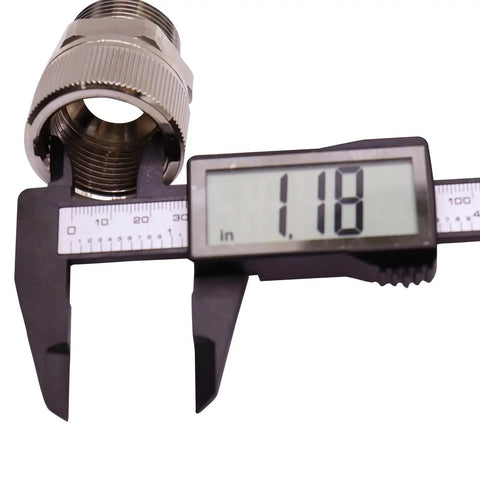 1 Inch NPT Female To 1 Inch NPT Male Fuel Hose Swivel Connector measured with caliper, showing diameter as 1.18 inches