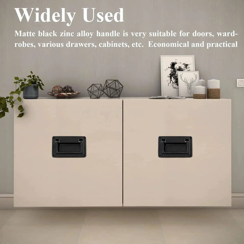 Room interior with cabinets featuring Concealed Recessed Pull Handle In Black Zinc Alloy Flush Mount Hidden Door Hardware 95mm by 60mm.