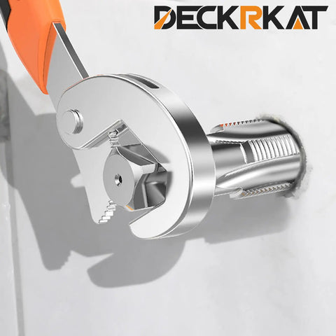 Adjustable wrench tightening a pipe fitting