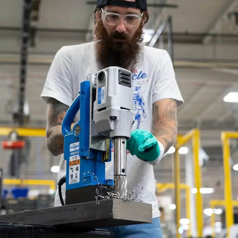 Worker using Powerful Magnetic Drill HMD900 115V With 1.5 By 2 Inch Capacity, Hidden Cord, Ergonomic Housing in workshop