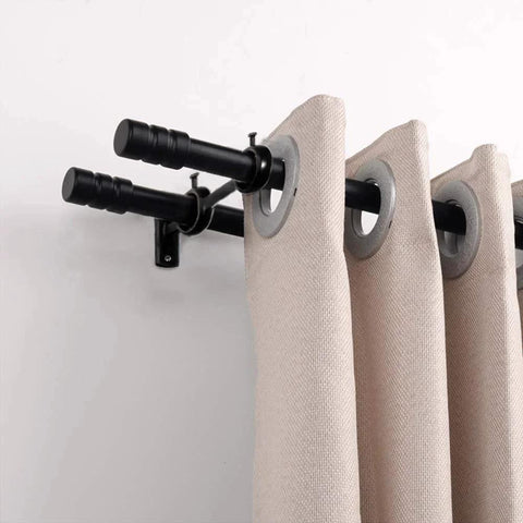 Installed view of the Three Piece Adjustable Curtain Rod Brackets Set With Double Wall Mount Holders holding beige curtains, durable black finish.