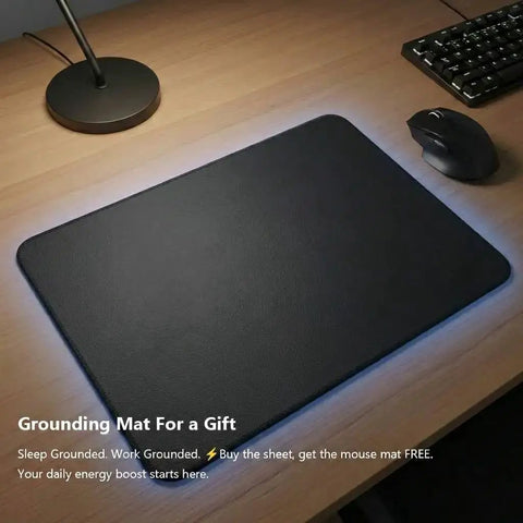 Desk with Grounding Mouse Pad from Grounding Fitted Sheets With 25 Percent Silver Infused Fiber And Cotton wellness kit.