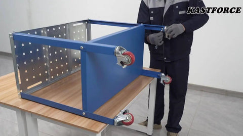 Person assembling rust free welding table 36 by 18 inches beefed up universal work cart with five eighth inch hole pattern.